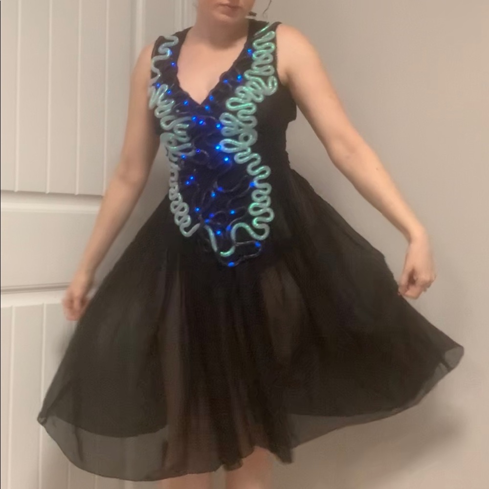Sheer little black dress with LED string lights